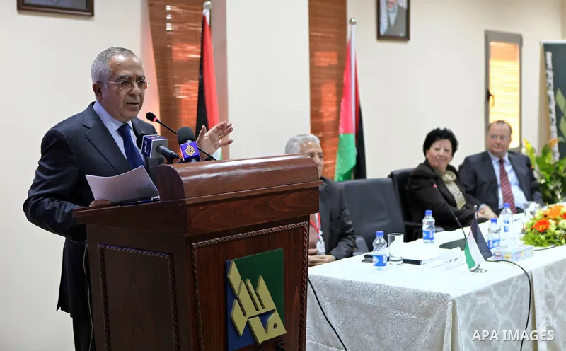 Palestinian Prime Minister, Salam Fayyad attends the opening ceremony of the annual conference held by Mass institution in the West Bank city of Ramallah on Jan. 23,2011. Photo by Mustafa Abu Dayeh