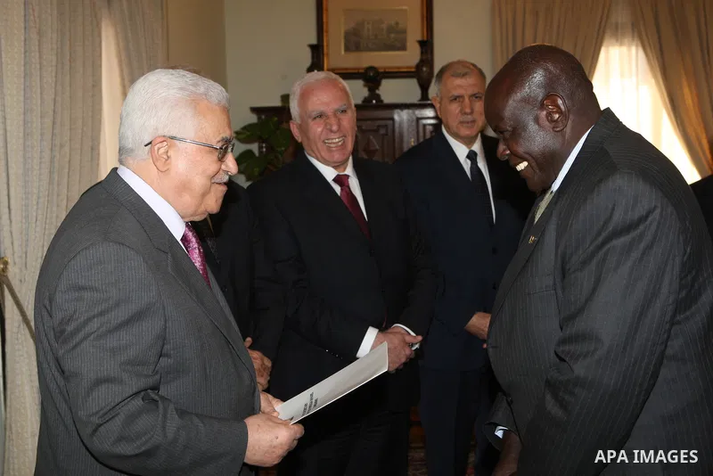 Palestinian President Mahmoud Abbas, accepts the credentials of the Ambassador of the Republic of Zimbabwe, in Cairo on Jan. 24, 2011. Photo by Thaer Ganaim