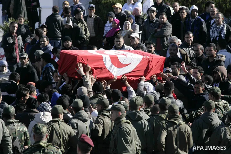 Tunisian protesters gather to demand a new government free of officials of the ousted regime of former president Zine el Abidine Ben Ali, near the Prime Minister's office in Tunis, Tunisia, 24 January 2011. According to...