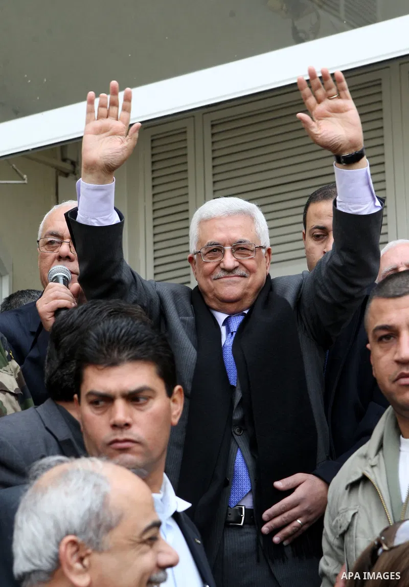 Palestinian President Mahmoud Abbas is welcomed by his supporters upon his arrival from Cairo at the West Bank city of Ramallah January 25, 2011. Abbas got a hero's welcome on Tuesday from thousands of Palestinians who d...