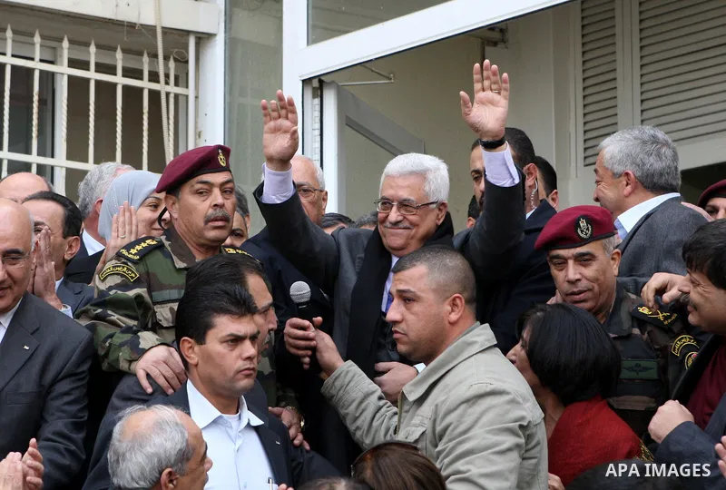 Palestinian President Mahmoud Abbas is welcomed by his supporters upon his arrival from Cairo at the West Bank city of Ramallah January 25, 2011. Abbas got a hero's welcome on Tuesday from thousands of Palestinians who d...
