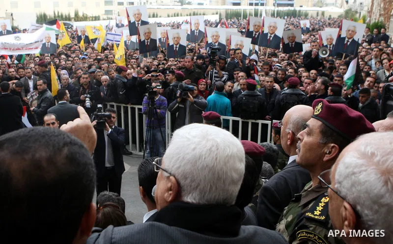 Palestinian President Mahmoud Abbas is welcomed by his supporters upon his arrival from Cairo at the West Bank city of Ramallah January 25, 2011. Abbas got a hero's welcome on Tuesday from thousands of Palestinians who d...