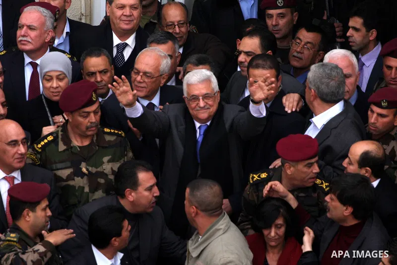Palestinian President Mahmoud Abbas is welcomed by his supporters upon his arrival from Cairo at the West Bank city of Ramallah January 25, 2011. Abbas got a hero's welcome on Tuesday from thousands of Palestinians who d...