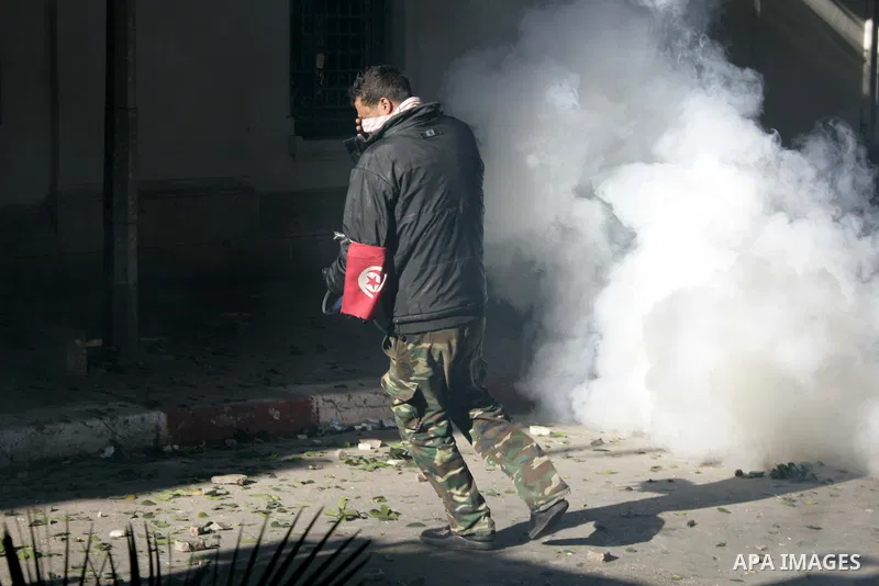 Tunisian policemen fire tear gas canisters at protestors during a demonstration against Prime Minister Mohammed Ghannouchi in front of the government palace in Tunis.Tunisia, 26 January 2011, Hundreds of defiant Tunisian...