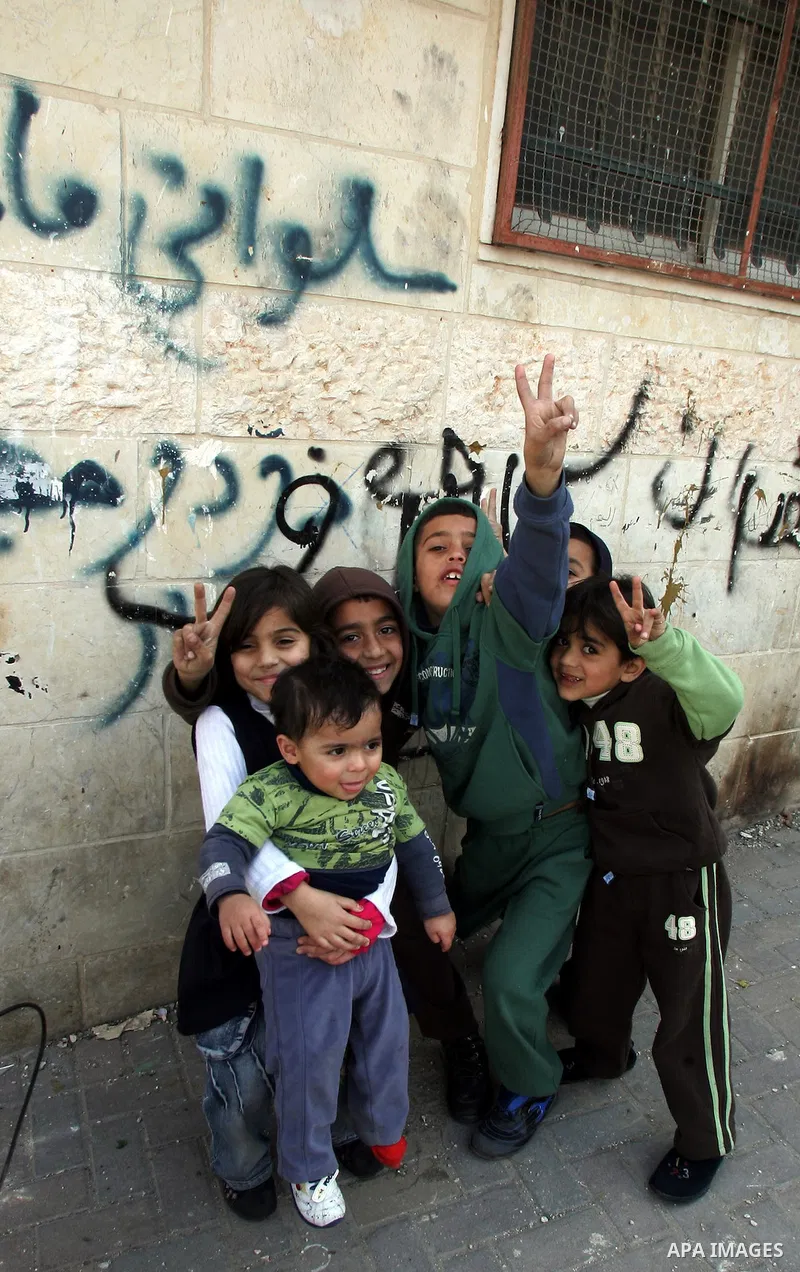 Palestinian children play in the mostly Arab neighbourhood of Silwan in east Jerusalem on Jan 26, 2011. A day after leaked documents were published by Al-Jazeera, showing Palestinians offered Israel major concessions on...