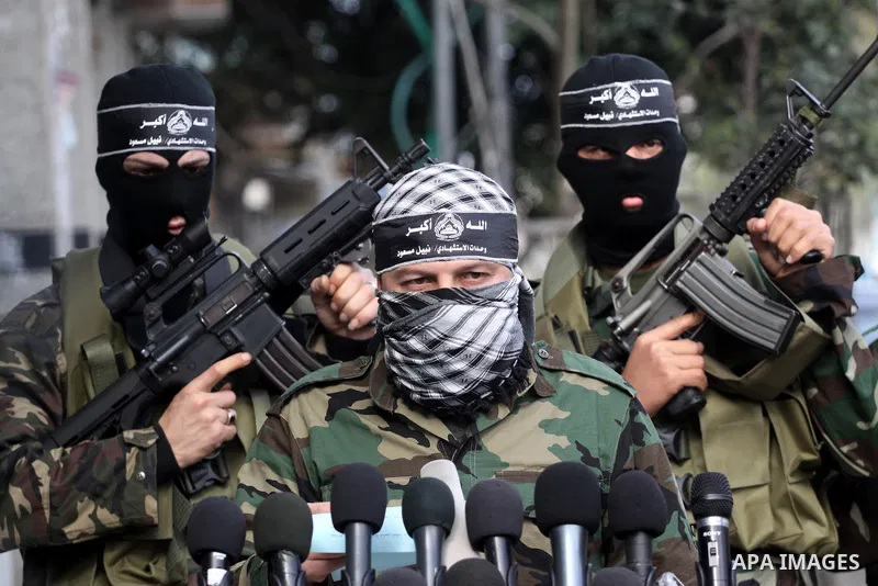 Palestinian militants from the al-Aqsa Martyrs Brigades give a press conference in which they denounced the alleged major concessions made by rival Palestinian leaders during peace talks with Israel, on January 27, 2011...