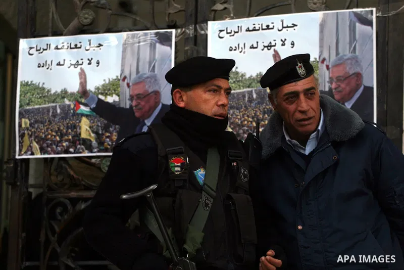 Palestinian Police on guard at the entrance of the Al-Jazeera office in the West Bank town of Ramallah on 27 January 2011. Al-Jazeera, a Qatar-based Arab satellite station, this week published excerpts from what it said...