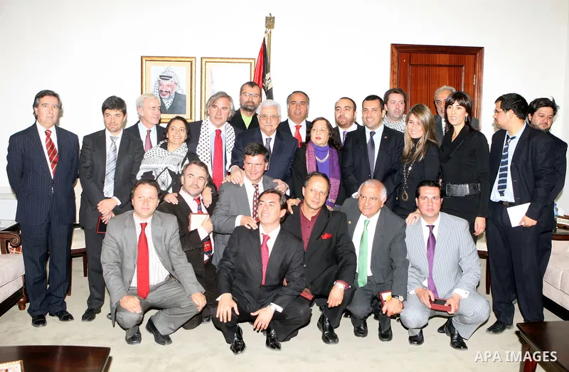 Palestinian President Mahmoud Abbas during a meeting with a parliamentary delegation from Chile headed by Ivan Moreira Barros in the West Bank city of Ramallah, on Jan. 27, 2011. photo by Thaer Ganaim