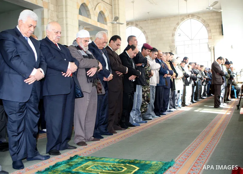 Palestinian President Mahmoud Abbas attends Friday prayers at Jamal Abdel Nasser mosque in the West Bank city of Ramallah on Jan. 28,2011. photo by Omar Rashidi