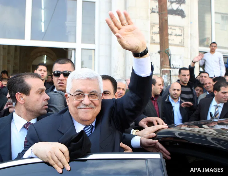 Palestinian President Mahmoud Abbas attends Friday prayers at Jamal Abdel Nasser mosque in the West Bank city of Ramallah on Jan. 28,2011. photo by Omar Rashidi