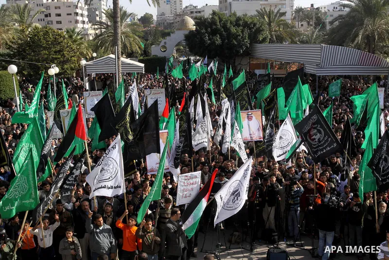 Palestinians protest against Palestinian President Mahmoud Abbas and his government following a recent broadcast by Al-Jazeera reportedly linking him to making broad concessions to Israel in peace talks, in Gaza city, Fr...