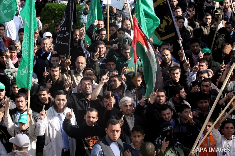Palestinians protest against Palestinian President Mahmoud Abbas and his government following a recent broadcast by Al-Jazeera reportedly linking him to making broad concessions to Israel in peace talks, in Gaza city, Fr...