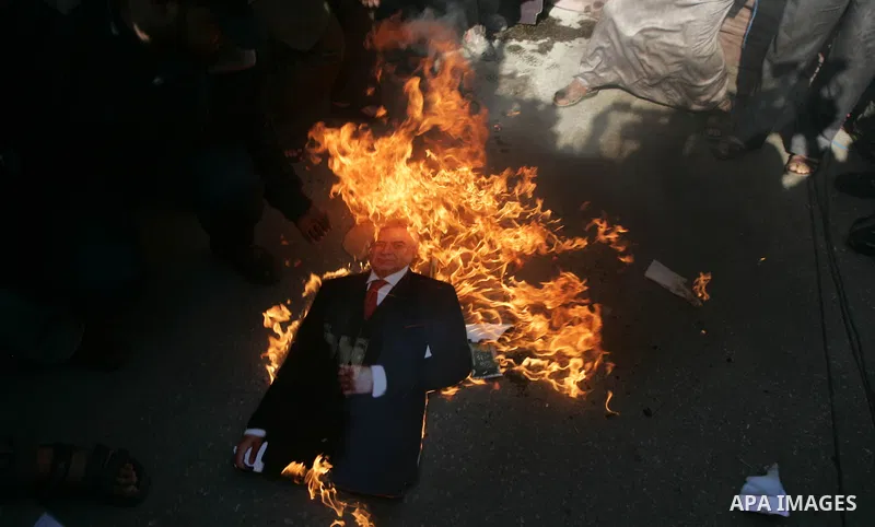 Palestinian Hamas activists protest against Palestinian President Mahmoud Abbas and his government following a recent broadcast by Al-Jazeera reportedly linking him to making broad concessions to Israel in peace talks, i...