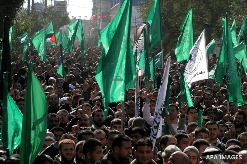 Palestinian Hamas activists protest against Palestinian President Mahmoud Abbas and his government following a recent broadcast by Al-Jazeera reportedly linking him to making broad concessions to Israel in peace talks, i...