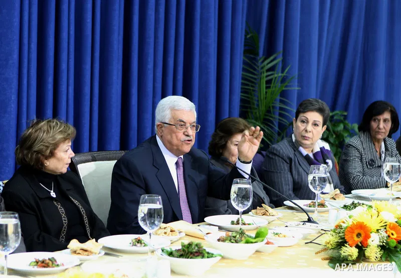 Palestinian President, Mahmoud Abbas (Abu Mazen) meets with a delegation from the General Union of Palestinian women in the West Bank town of Ramallah on Jan. 29,2011. photo by Omar Rashidi