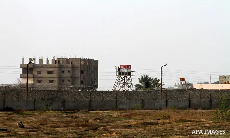 An Egyptian soldier stands guard on a control tower in the border with the Gaza Strip in the city of Rafah, southern Gaza Strip on, 29 January 2011. The embattled Mubarak tapped Egypt's military intelligence chief as his...