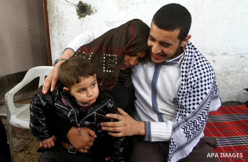 Hassan Weshah a political prisoner arrives to his home after he fled from the prison of Abu Zaabal in Egypt, in the Bureij refugee camp , Sunday, Jan. 30 , 2011. Photo by Ashraf Amra