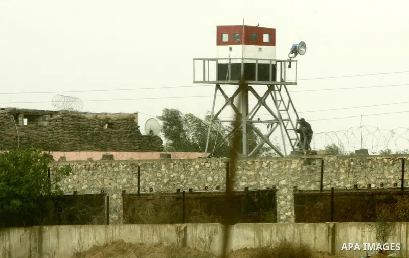 An Egyptian soldier stands guard on a control tower in the border with the Gaza Strip in the city of Rafah, southern Gaza Strip on January, 30, 2011. at least two of the prisoners who had been held in Abu Zaabal prison,...
