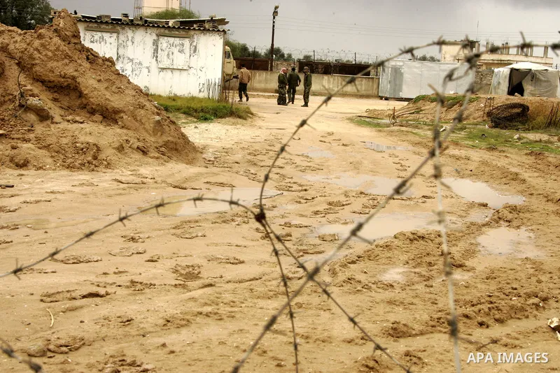 Members of Hamas's security forces stand guard at the Palestinian side of the border in the southern Gaza in the city of Rafah, southern Gaza Strip on January, 30, 2011. at least two of the prisoners who had been held in...