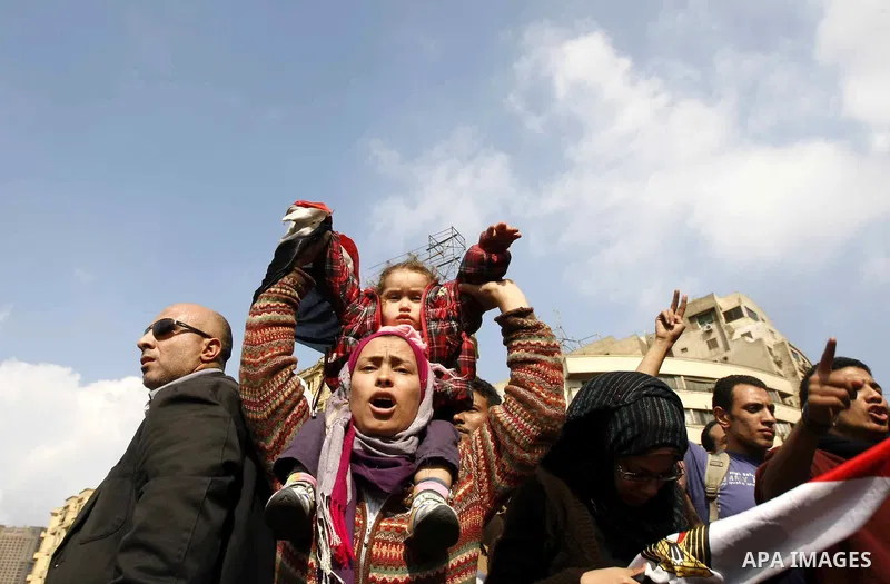 Egyptian demonstrators take part in a protest in Cairo, Egypt, Sunday, Jan. 30, 2011. Photo by STR