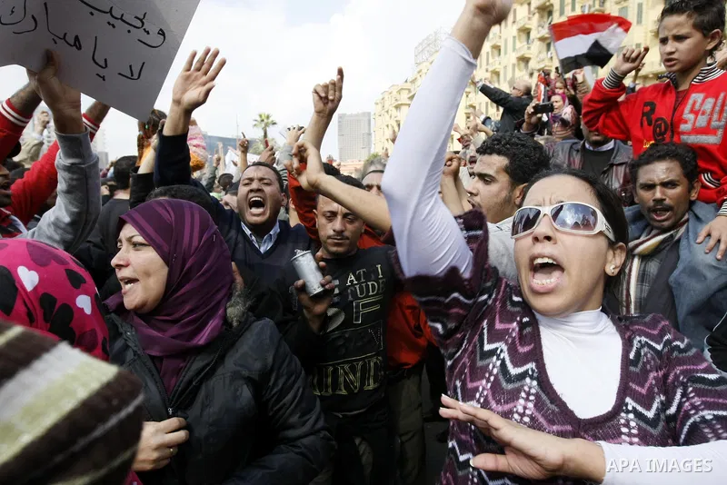 Egyptian demonstrators take part in a protest in Cairo, Egypt, Sunday, Jan. 30, 2011. Photo by STR