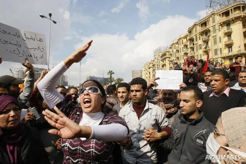 Egyptian demonstrators take part in a protest in Cairo, Egypt, Sunday, Jan. 30, 2011. Photo by STR