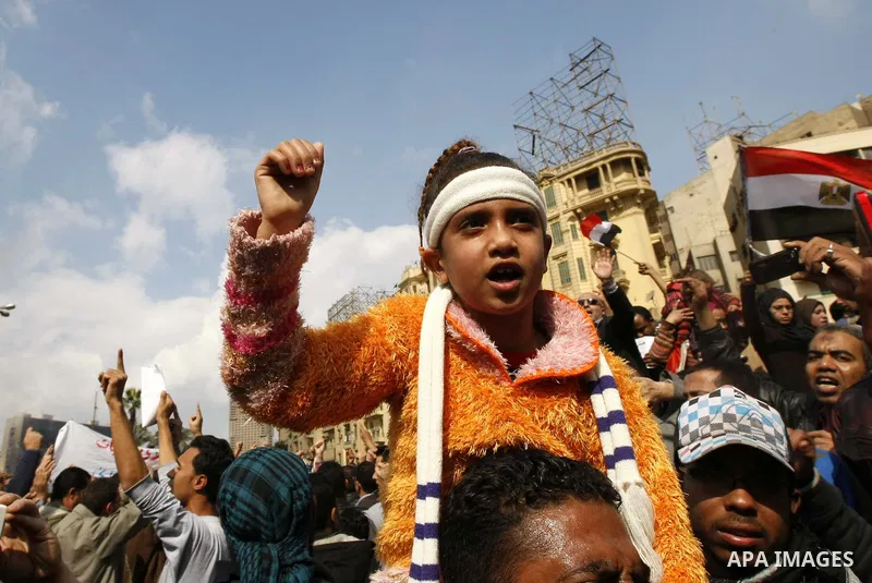 Egyptian demonstrators take part in a protest in Cairo, Egypt, Sunday, Jan. 30, 2011. Photo by STR