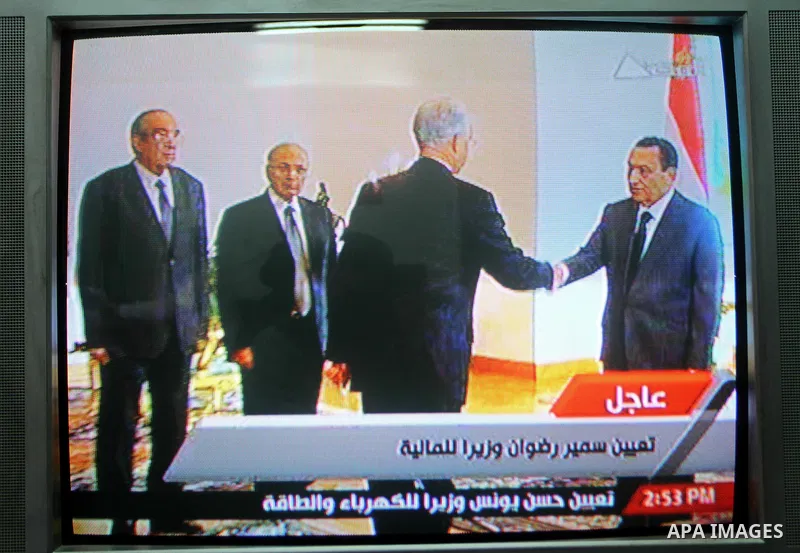 In this image taken from Egypt State TV, showing Egyptian President Hosni Mubarak during a ceremony to swear in the new government Cabinet as broadcast on Egypt State TV, Monday Jan. 31, 2011. Egypt named its new governm...