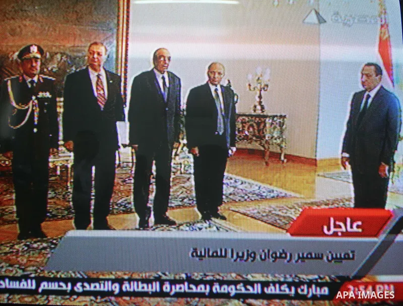In this image taken from Egypt State TV, showing Egyptian President Hosni Mubarak during a ceremony to swear in the new government Cabinet as broadcast on Egypt State TV, Monday Jan. 31, 2011. Egypt named its new governm...