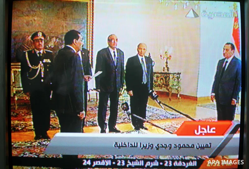 In this image taken from Egypt State TV, showing Egyptian President Hosni Mubarak during a ceremony to swear in the new government Cabinet as broadcast on Egypt State TV, Monday Jan. 31, 2011. Egypt named its new governm...