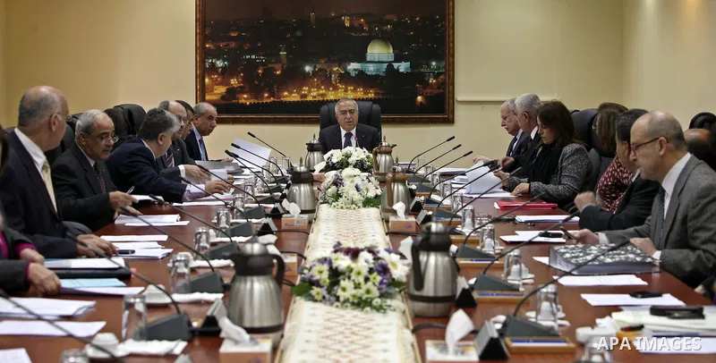 Palestinian Prime Minister Salam Fayyad heads the Palestinian cabinet meeting in the West Bank city of Ramallah on Feb. 1,2011. Photo by Mustafa Abu Dayeh