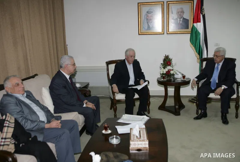 Palestinian President Mahmoud Abbas during a meeting with with a delegation from the forum of thought and dialogue in the West Bank city of Ramallah on Feb. 1,2011. photo by Omar Rashidi