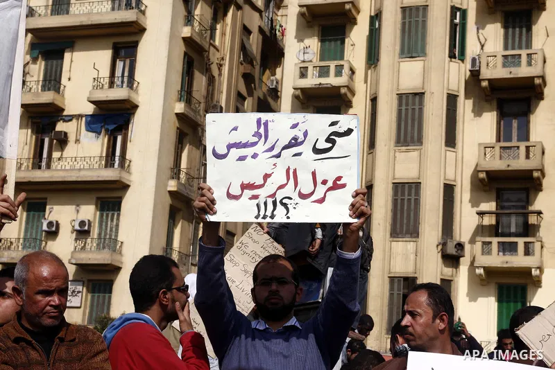 Anti-government protesters demonstrate in Tahrir, or Liberation Square in Cairo, Egypt, Tuesday, Feb. 1, 2011. More than a quarter-million people flooded into the heart of Cairo Tuesday, filling the city's main square in...