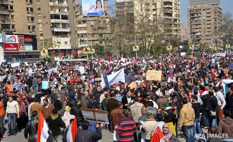 Supporters of President Hosni Mubarak takes part in a protest in Cairo, Egypt, Wednesday, Feb. 2, 2011. Several thousand supporters of President Hosni Mubarak, including some riding horses and camels and wielding whips,...