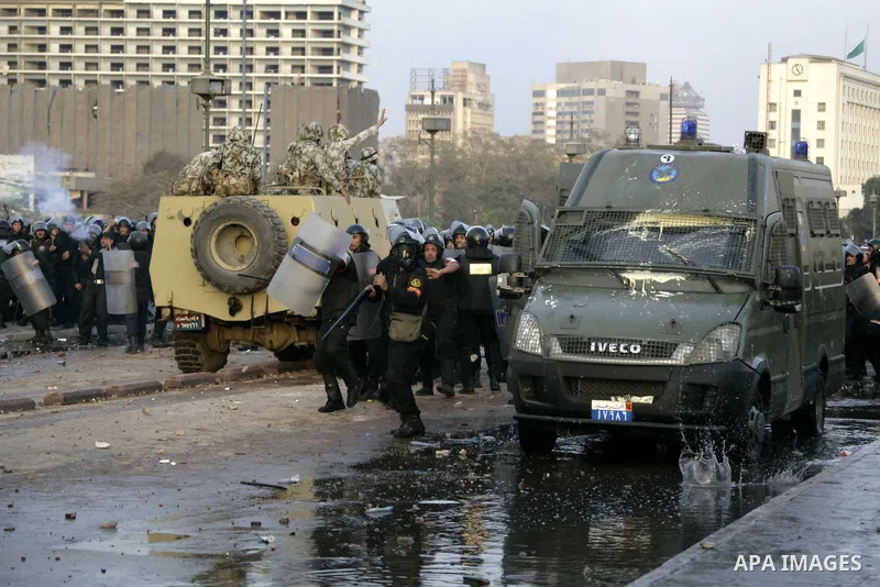 Egyptian policemen fire tear gas canisters towards anti-government protesters during a demonstration against president Hosni Mubarak regime in Tahrir, or Liberation Square in Cairo, Egypt, Jan. 29, 2011. Photo by Karam N...