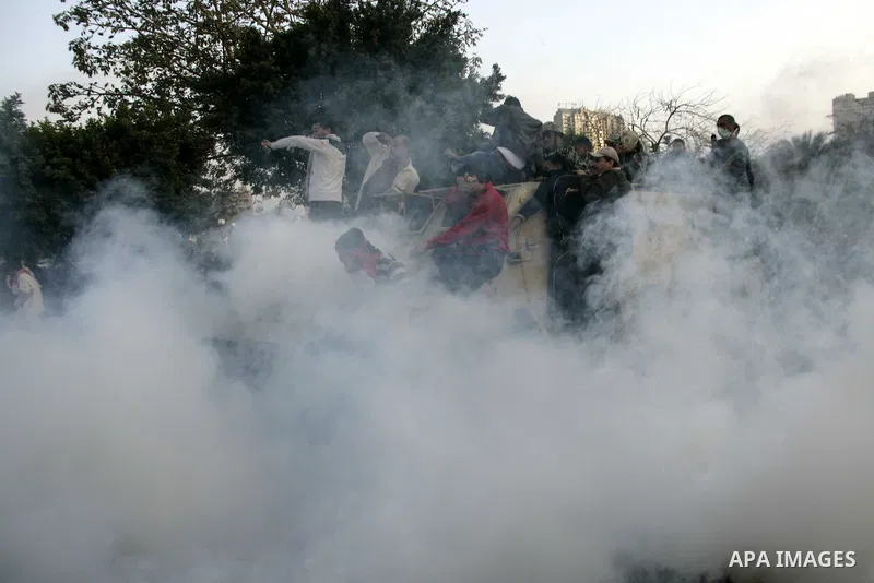 Egyptian policemen fire tear gas canisters towards anti-government protesters during a demonstration against president Hosni Mubarak regime in Tahrir, or Liberation Square in Cairo, Egypt, Jan. 29, 2011. Photo by Karam N...