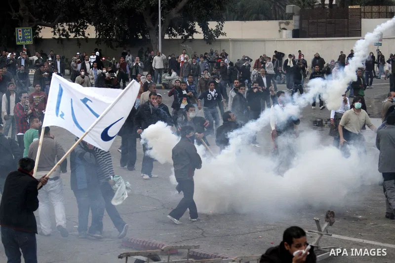 Egyptian policemen fire tear gas canisters towards anti-government protesters during a demonstration against president Hosni Mubarak regime in Tahrir, or Liberation Square in Cairo, Egypt, Jan. 29, 2011. Photo by Karam N...