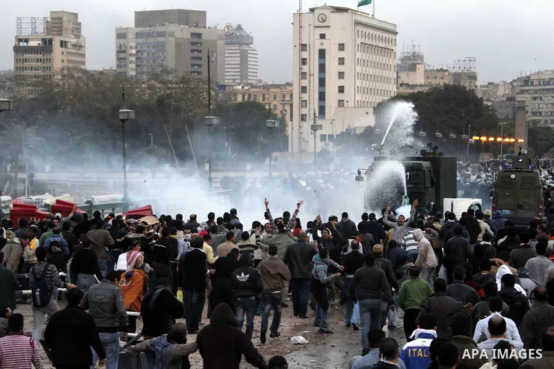 Egyptian policemen fire tear gas canisters towards anti-government protesters during a demonstration against president Hosni Mubarak regime in Tahrir, or Liberation Square in Cairo, Egypt, Jan. 29, 2011. Photo by Karam N...