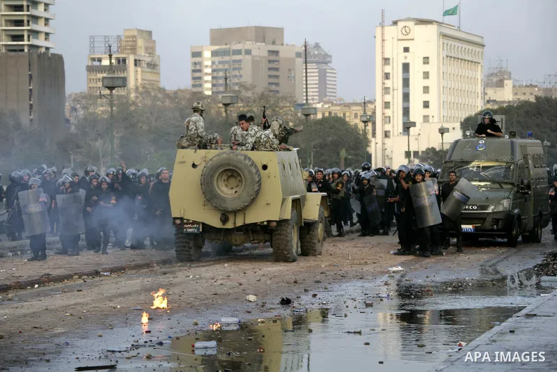 Egyptian policemen fire tear gas canisters towards anti-government protesters during a demonstration against president Hosni Mubarak regime in Tahrir, or Liberation Square in Cairo, Egypt, Jan. 29, 2011. Photo by Karam N...