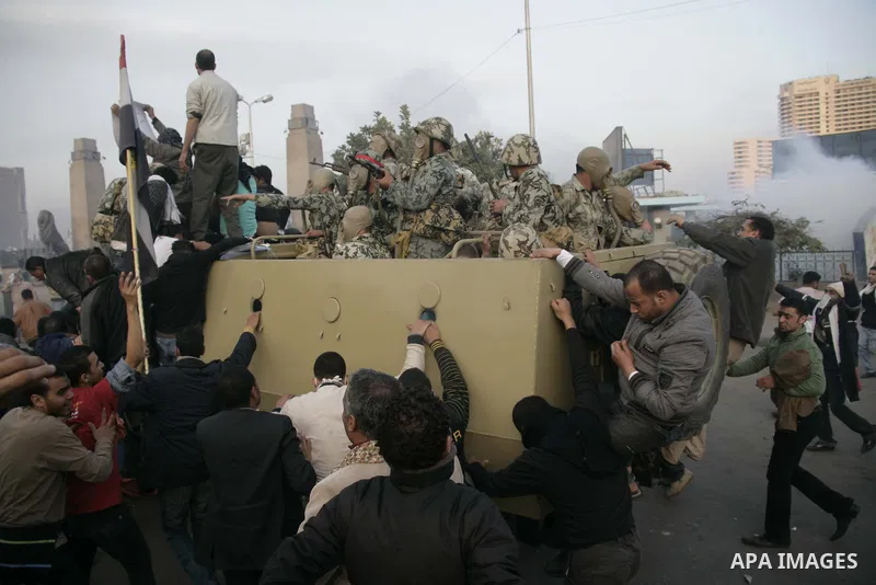 Egyptian policemen fire tear gas canisters towards anti-government protesters during a demonstration against president Hosni Mubarak regime in Tahrir, or Liberation Square in Cairo, Egypt, Jan. 29, 2011. Photo by Karam N...