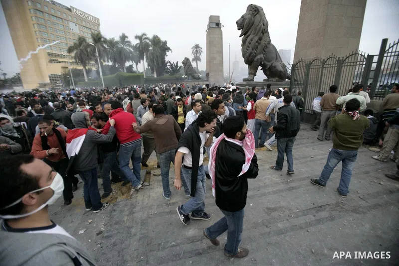 Egyptian policemen fire tear gas canisters towards anti-government protesters during a demonstration against president Hosni Mubarak regime in Tahrir, or Liberation Square in Cairo, Egypt, Jan. 29, 2011. Photo by Karam N...