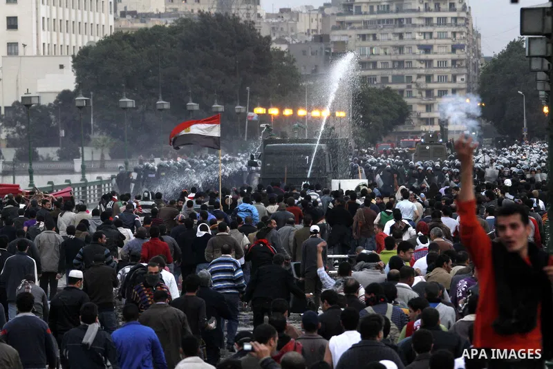 Egyptian policemen fire tear gas canisters towards anti-government protesters during a demonstration against president Hosni Mubarak regime in Tahrir, or Liberation Square in Cairo, Egypt, Jan. 29, 2011. Photo by Karam N...