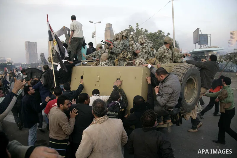 Egyptian policemen fire tear gas canisters towards anti-government protesters during a demonstration against president Hosni Mubarak regime in Tahrir, or Liberation Square in Cairo, Egypt, Jan. 29, 2011. Photo by Karam N...
