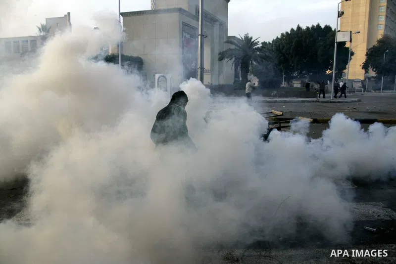 Egyptian policemen fire tear gas canisters towards anti-government protesters during a demonstration against president Hosni Mubarak regime in Tahrir, or Liberation Square in Cairo, Egypt, Jan. 29, 2011. Photo by Karam N...