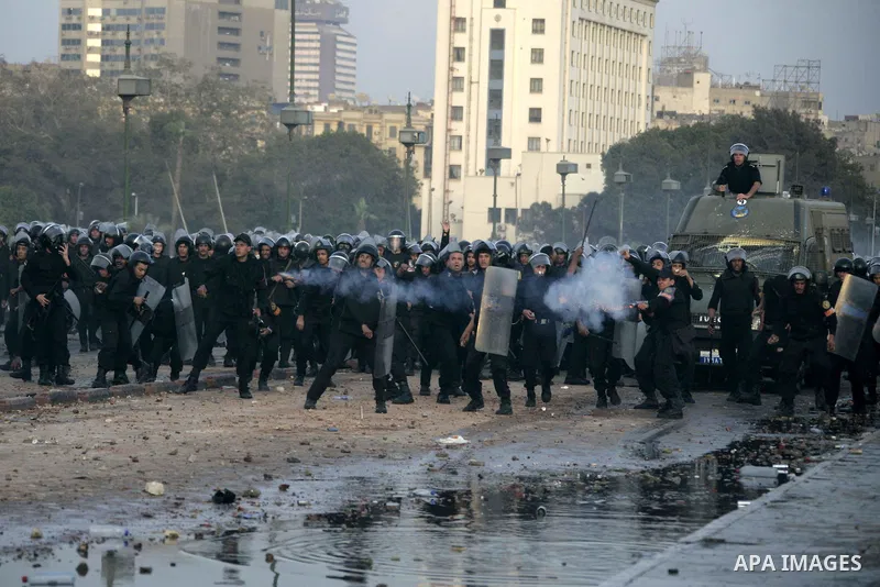 Egyptian policemen fire tear gas canisters towards anti-government protesters during a demonstration against president Hosni Mubarak regime in Tahrir, or Liberation Square in Cairo, Egypt, Jan. 29, 2011. Photo by Karam N...