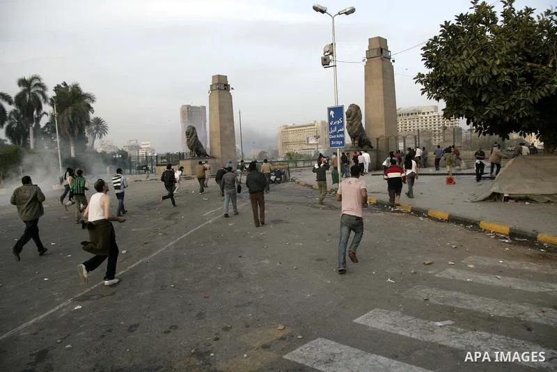 Egyptian policemen fire tear gas canisters towards anti-government protesters during a demonstration against president Hosni Mubarak regime in Tahrir, or Liberation Square in Cairo, Egypt, Jan. 29, 2011. Photo by Karam N...