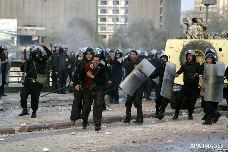 Egyptian policemen fire tear gas canisters towards anti-government protesters during a demonstration against president Hosni Mubarak regime in Tahrir, or Liberation Square in Cairo, Egypt, Jan. 29, 2011. Photo by Karam N...