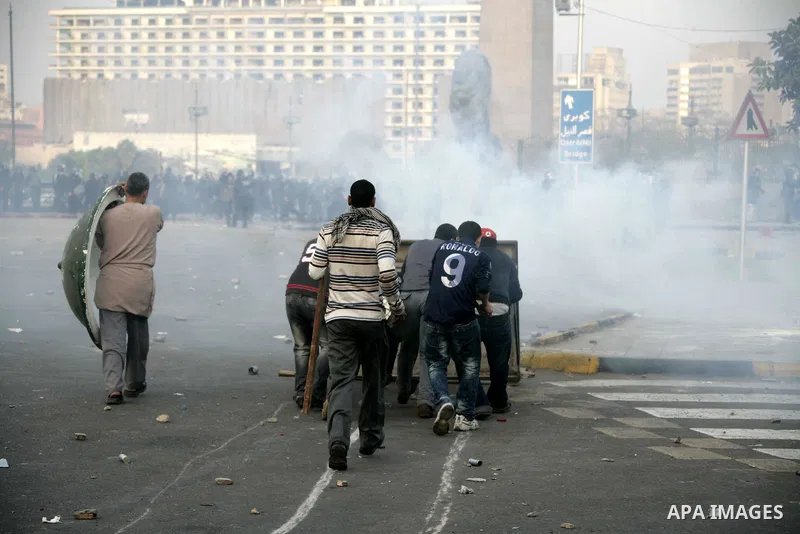 Egyptian policemen fire tear gas canisters towards anti-government protesters during a demonstration against president Hosni Mubarak regime in Tahrir, or Liberation Square in Cairo, Egypt, Jan. 29, 2011. Photo by Karam N...