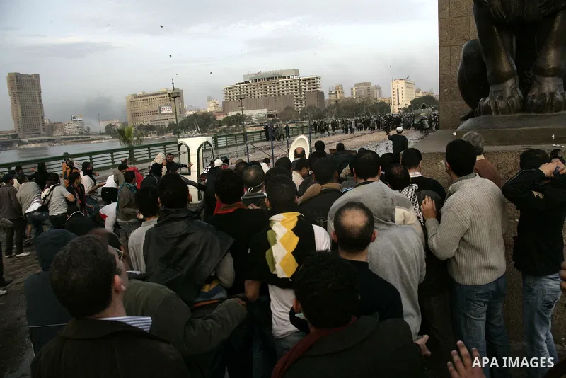 Egyptian policemen fire tear gas canisters towards anti-government protesters during a demonstration against president Hosni Mubarak regime in Tahrir, or Liberation Square in Cairo, Egypt, Jan. 29, 2011. Photo by Karam N...