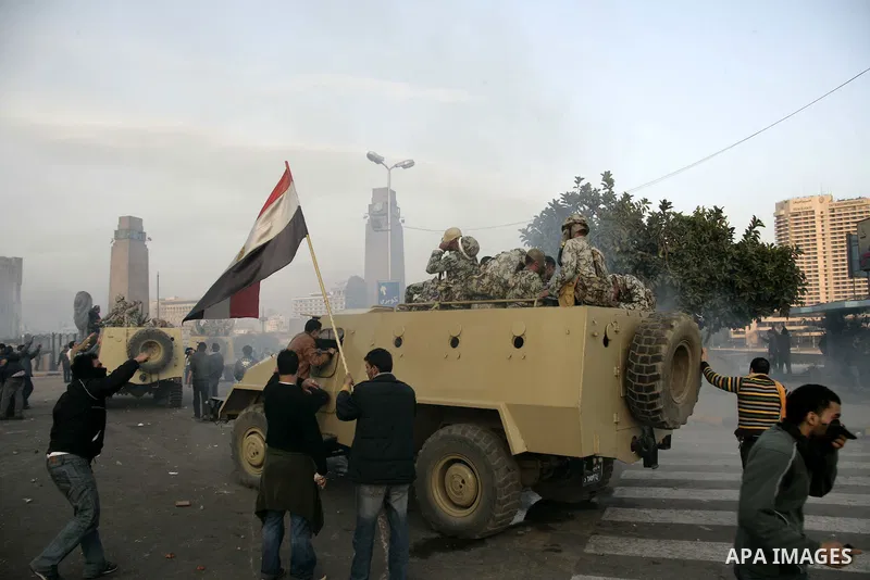 Egyptian policemen fire tear gas canisters towards anti-government protesters during a demonstration against president Hosni Mubarak regime in Tahrir, or Liberation Square in Cairo, Egypt, Jan. 29, 2011. Photo by Karam N...